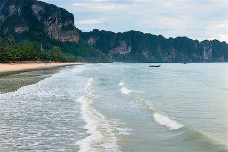 simsearch:400-09010275,k - Thai wooden boat on the waves in the bay of Krabi resort, Thailand Photographie de stock - Aubaine LD & Abonnement, Code: 400-09010275
