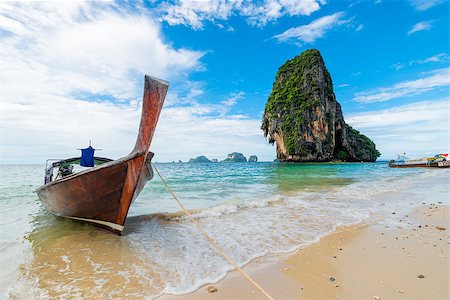Sunny day, seascape coast of Thailand resort and traditional boats Stock Photo - Budget Royalty-Free & Subscription, Code: 400-09010472