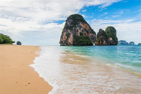 simsearch:400-05386174,k - Turquoise water of the Andaman Sea rolling waves on the sandy beach of Thailand Stock Photo - Budget Royalty-Free & Subscription, Code: 400-09010473