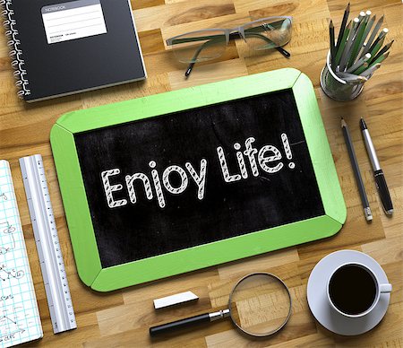 simsearch:400-08750298,k - Small Chalkboard with Enjoy Life Concept. Enjoy Life Handwritten on Green Chalkboard. Top View Composition with Small Chalkboard on Working Table with Office Supplies Around. 3d Rendering. Stockbilder - Microstock & Abonnement, Bildnummer: 400-09010673