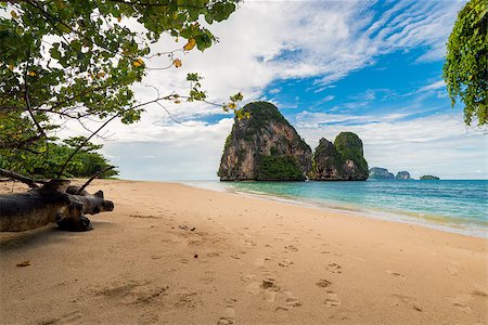 A deserted sandy beach and a beautiful cliff in the Sea, Thailand Stock Photo - Budget Royalty-Free & Subscription, Code: 400-09010736