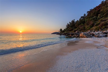 Sunrise in Marble beach (Saliara beach), Thassos Islands, Greece. The most beautiful white beach in Greece Photographie de stock - Aubaine LD & Abonnement, Code: 400-09011444