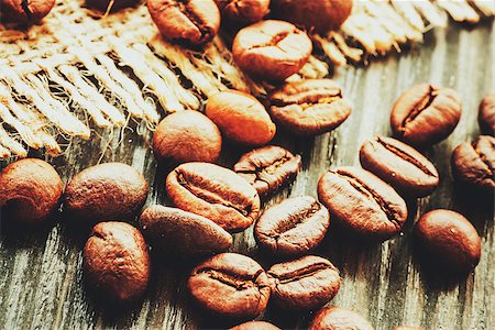 simsearch:400-04603391,k - Coffee. Coffe beans on wood. Vintage coffee Fotografie stock - Microstock e Abbonamento, Codice: 400-09028285