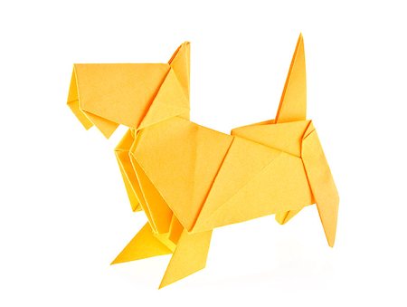 simsearch:400-09170569,k - Yellow scotch terrier of origami, isolated on white background. Foto de stock - Super Valor sin royalties y Suscripción, Código: 400-09028497