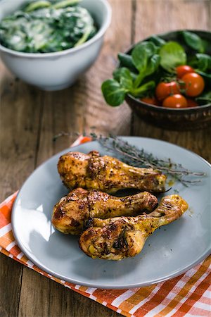 simsearch:400-04864579,k - Roasted chicken legs with fresh vegetables and herbs Stock Photo - Budget Royalty-Free & Subscription, Code: 400-09028809