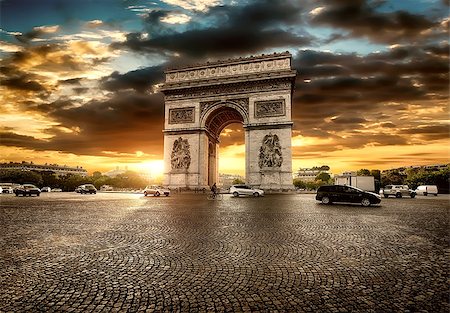 sunset tree with car - Beautiful cloudy sunset over Arc de Triomphe in Paris, France Stock Photo - Budget Royalty-Free & Subscription, Code: 400-09028919