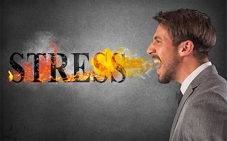 simsearch:400-08258105,k - Businessman burns the word stress. stressed business life concept Stock Photo - Budget Royalty-Free & Subscription, Code: 400-09029114