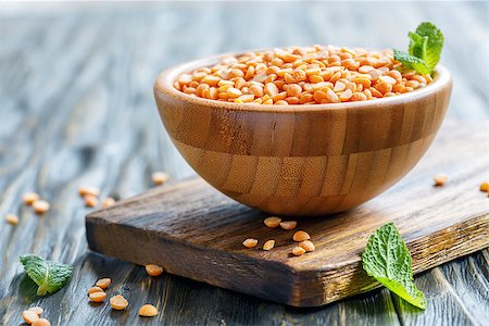 simsearch:400-06391712,k - Split yellow peas in a bowl on old wooden table, selective focus. Photographie de stock - Aubaine LD & Abonnement, Code: 400-09029186