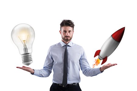 simsearch:400-09112433,k - Businessman compares a lightbulb to a rocket. concept od idea and start-up Stockbilder - Microstock & Abonnement, Bildnummer: 400-09029487