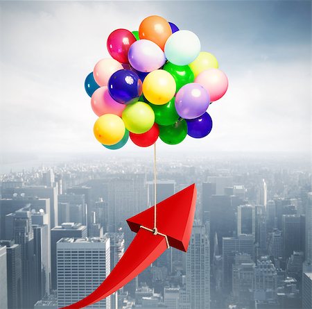 simsearch:400-08668627,k - Arrow raised by flying balloons. fly to economic success Stock Photo - Budget Royalty-Free & Subscription, Code: 400-09029549