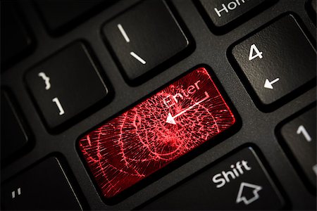 Message on broken red enter key of keyboard. Computer virus attack. Copy space Photographie de stock - Aubaine LD & Abonnement, Code: 400-09030127