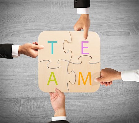 Concept of team that works together with puzzle Stock Photo - Budget Royalty-Free & Subscription, Code: 400-09030157