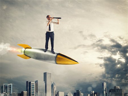 Businessman looks through binoculars from above a missile. 3D Rendering Foto de stock - Super Valor sin royalties y Suscripción, Código: 400-09030152