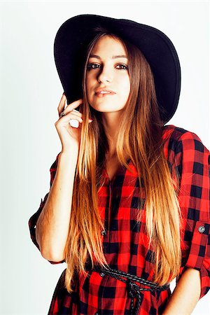 young pretty brunette girl hipster in hat on white background casual close up dreaming smiling. real american modern woman, lifestyle normal people concept Stock Photo - Budget Royalty-Free & Subscription, Code: 400-09030290