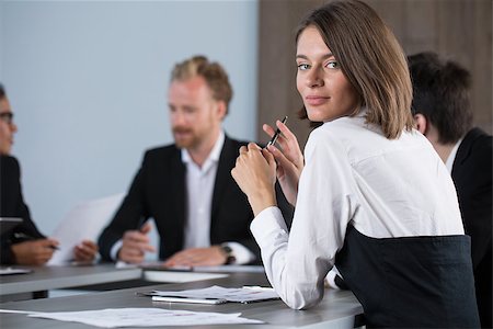 simsearch:400-08554629,k - Team of business people work together in office. Concept of teamwork and partnership Fotografie stock - Microstock e Abbonamento, Codice: 400-09030358