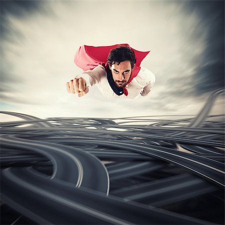 Male superhero with read cloak flying fast over road junctions. Concept of success and breakthrough Stock Photo - Budget Royalty-Free & Subscription, Code: 400-09030366