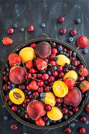 rustic tray - Fresh ripe summer berries and fruits (peaches, apricots, cherries and strawberries) on tray Stock Photo - Budget Royalty-Free & Subscription, Code: 400-09030615