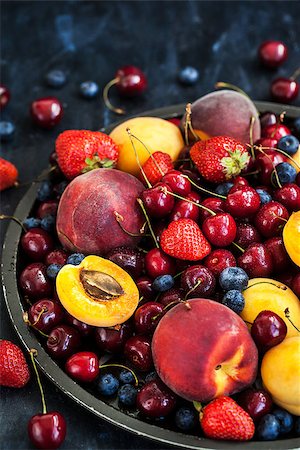 rustic tray - Fresh ripe summer berries and fruits (peaches, apricots, cherries and strawberries) on tray Stock Photo - Budget Royalty-Free & Subscription, Code: 400-09030617