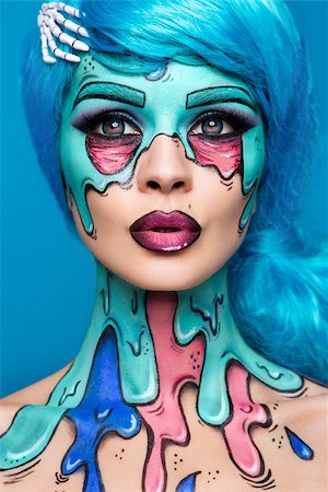 simsearch:400-07209176,k - Fashionable zombie girl. Portrait of a pin-up zombie woman. Body-painting project. Halloween make-up. Horror. Photographie de stock - Aubaine LD & Abonnement, Code: 400-09031371