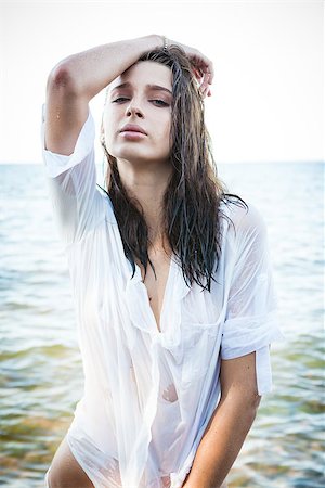 evening dress on beach - Young lady with wet hair in white shirt coming out of the sea Stock Photo - Budget Royalty-Free & Subscription, Code: 400-09032383