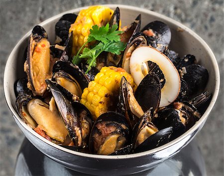 Mussels in curry cream sauce over concrete background Stock Photo - Budget Royalty-Free & Subscription, Code: 400-09045689