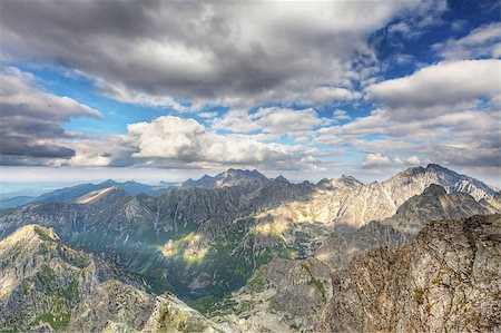 simsearch:400-06748383,k - View on high Tatra Mountains from Rysy mountain with dramatic cloudy sky Fotografie stock - Microstock e Abbonamento, Codice: 400-09050288