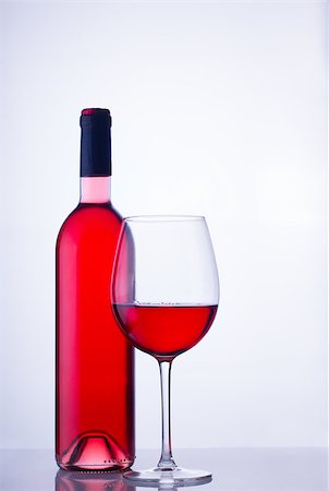 simsearch:400-04264239,k - High glass with still rose wine and wine bottle Stock Photo - Budget Royalty-Free & Subscription, Code: 400-09064001