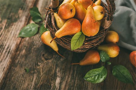 simsearch:400-05381568,k - Healthy organic pears in the basket with copy space. Toned image. Stock Photo - Budget Royalty-Free & Subscription, Code: 400-09064251