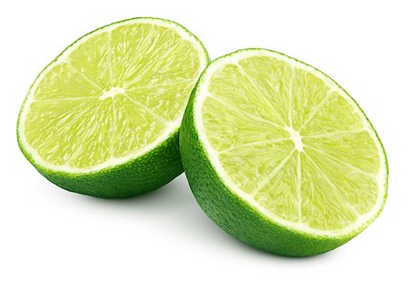 simsearch:400-08967896,k - Two halves of green lime citrus fruit isolated on white background. Lime halves with clipping path Photographie de stock - Aubaine LD & Abonnement, Code: 400-09064613