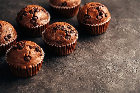 Chocolate Muffin with Chocolate Chips. Food background wiht copyspace. Fotografie stock - Microstock e Abbonamento, Codice: 400-09066957
