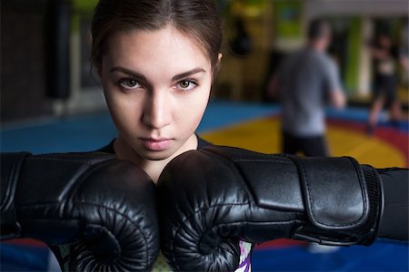 simsearch:400-04423524,k - Young adult sexy boxing girl posing with gloves. Confident woman ready to fight Foto de stock - Super Valor sin royalties y Suscripción, Código: 400-09062951