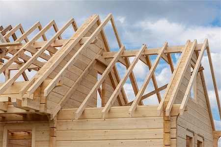 Structure of a wooden house under construction - Poland. Stock Photo - Budget Royalty-Free & Subscription, Code: 400-09063110