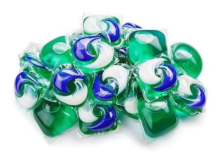 simsearch:400-08679975,k - Pile of washing gel capsule pods with laundry detergent isolated on white background with clipping path Photographie de stock - Aubaine LD & Abonnement, Code: 400-09063963