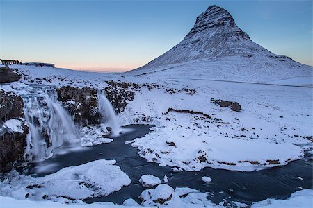 Taking a four hour drive from Reykjavik to find one of the most photographed mountains in the world. Kirkjufell mountain and falls. I would take this drive again in a heart beat. One of the most relaxing drives I have done this  far. Foto de stock - Super Valor sin royalties y Suscripción, Código: 400-09079917