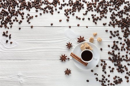 cup of coffee espresso and coffee beans on white wooden table Stock Photo - Budget Royalty-Free & Subscription, Code: 400-09070352