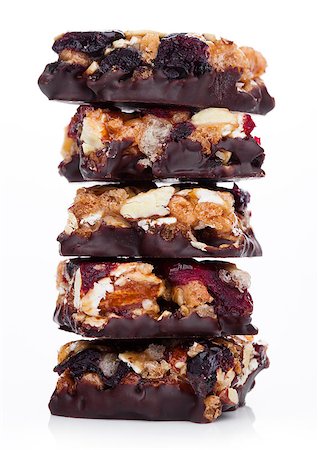 simsearch:400-09238081,k - Cereal bar with almonds and cranberries chocolate on white background Photographie de stock - Aubaine LD & Abonnement, Code: 400-09084294