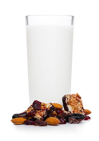 simsearch:400-09186057,k - Cereal bar bits almond chocolate and glass of milk on white background Foto de stock - Super Valor sin royalties y Suscripción, Código: 400-09084296