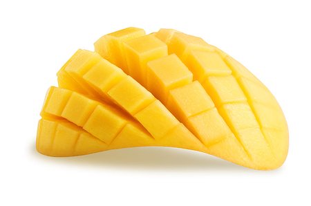 Mango isolated. Mango slice cut to cubes close-up isolated on white background, clipping path included Stock Photo - Budget Royalty-Free & Subscription, Code: 400-09084680