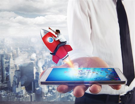 simsearch:400-09112433,k - Businessman launches rocket from the mobile phone. 3D Rendering Stockbilder - Microstock & Abonnement, Bildnummer: 400-09084893