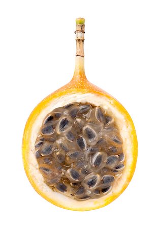 simsearch:400-08529320,k - Half of granadilla or grenadia passionfruit isolated on white background. Clipping path included Foto de stock - Super Valor sin royalties y Suscripción, Código: 400-09084968