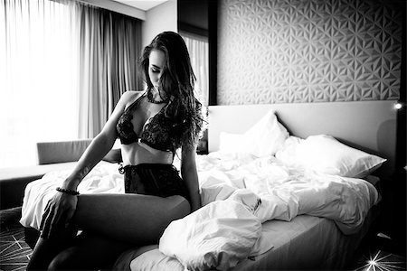 simsearch:400-07300733,k - Beautiful lady in sexy lingerie poses in hotel room Stock Photo - Budget Royalty-Free & Subscription, Code: 400-09085218