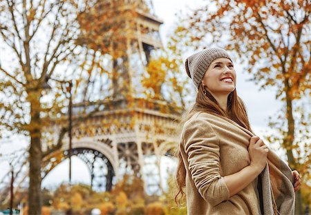 simsearch:400-09031587,k - Autumn getaways in Paris. Portrait of happy young elegant woman in Paris, France looking into the distance Stock Photo - Budget Royalty-Free & Subscription, Code: 400-09080953