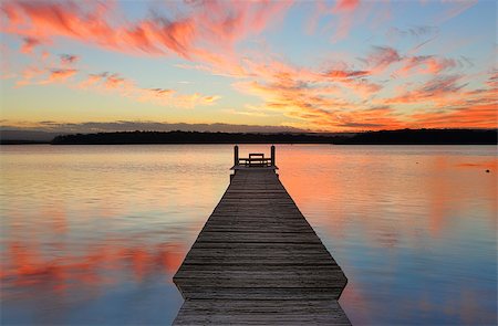 simsearch:400-07514503,k - Sunset over the St Georges Basin with beautifully restored timber jetty.  This jetty was destroyed in the recent floods of August 2015 Stock Photo - Budget Royalty-Free & Subscription, Code: 400-09081196