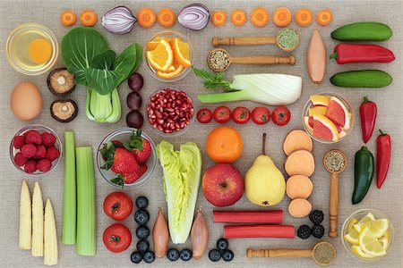 Super food for weight loss concept with fruit, vegetables, dairy, nutritional supplements and herbs used as appetite suppressants. Foods high anthocyanins, antioxidants, fiber and vitamins. Top view on hessian. Stock Photo - Budget Royalty-Free & Subscription, Code: 400-09081617