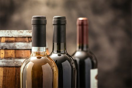simsearch:400-09222970,k - Expensive wine bottles collection and wooden barrel in the cellar, wine tasting and production concept Stock Photo - Budget Royalty-Free & Subscription, Code: 400-09082191