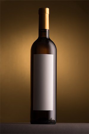 simsearch:400-09222970,k - Excellent white wine bottle with blank label on golden background Stock Photo - Budget Royalty-Free & Subscription, Code: 400-09082235