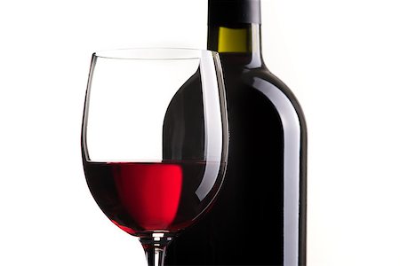 simsearch:400-09222970,k - Excellent red wine tasting: wine bottle and wineglass on white background, close up Stock Photo - Budget Royalty-Free & Subscription, Code: 400-09082239