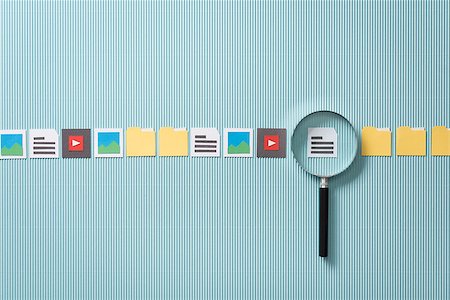 examination folder - File search, scan and analysis: magnifier zooming in on a file, paper cut icons Stock Photo - Budget Royalty-Free & Subscription, Code: 400-09082248