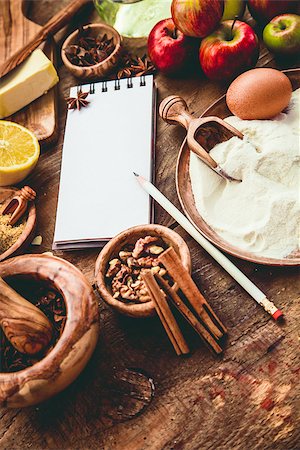 simsearch:400-07420117,k - Baking background with paper for notes. Christmas and winter  cookies ingredients.Baking pastry and cookies: apples, spices, sugar, eggs on wood Stock Photo - Budget Royalty-Free & Subscription, Code: 400-09082717