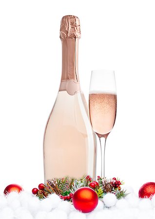 simsearch:400-09082853,k - Bottle and glass of pink rose champagne with christmas decoration and gift on white background Foto de stock - Super Valor sin royalties y Suscripción, Código: 400-09082847
